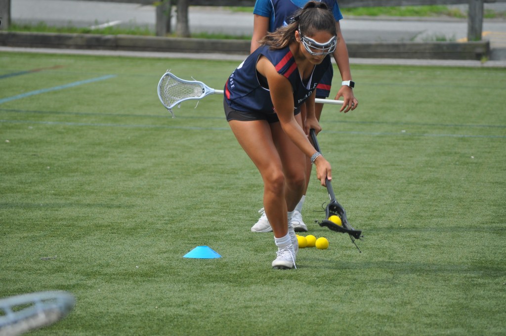 Players competing for a ground ball