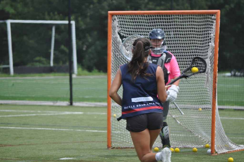Player shooting on goalie
