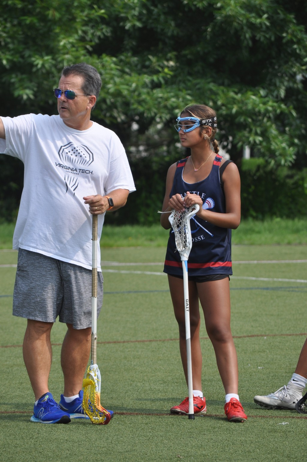Coach Dave giving instruction to players